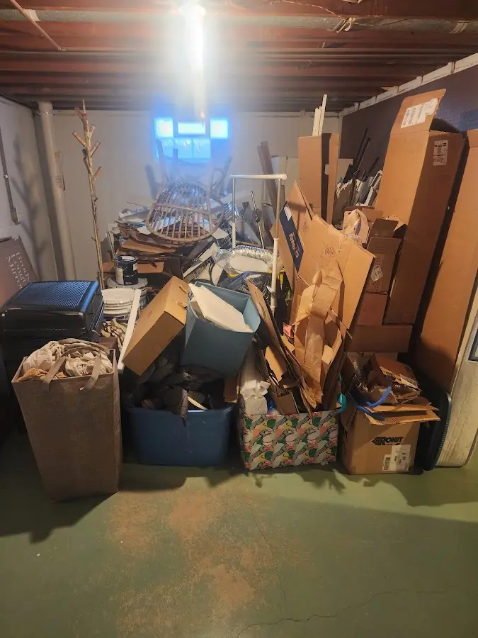 Roll-off dumpster container at job site for Concrete Dumpster Rental in Pelican Bay